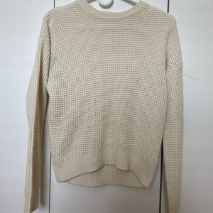 Medium sized knitted sweater.